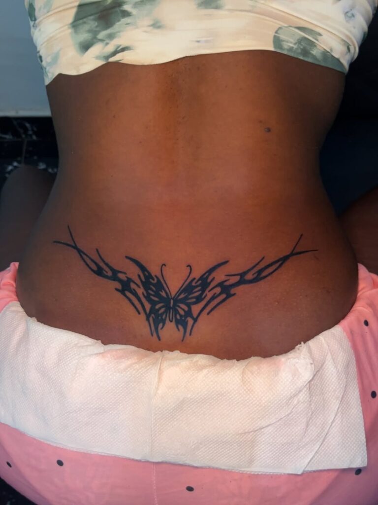 30 Lower Back Tattoo Designs to Bring Back Subtle Y2K Flair