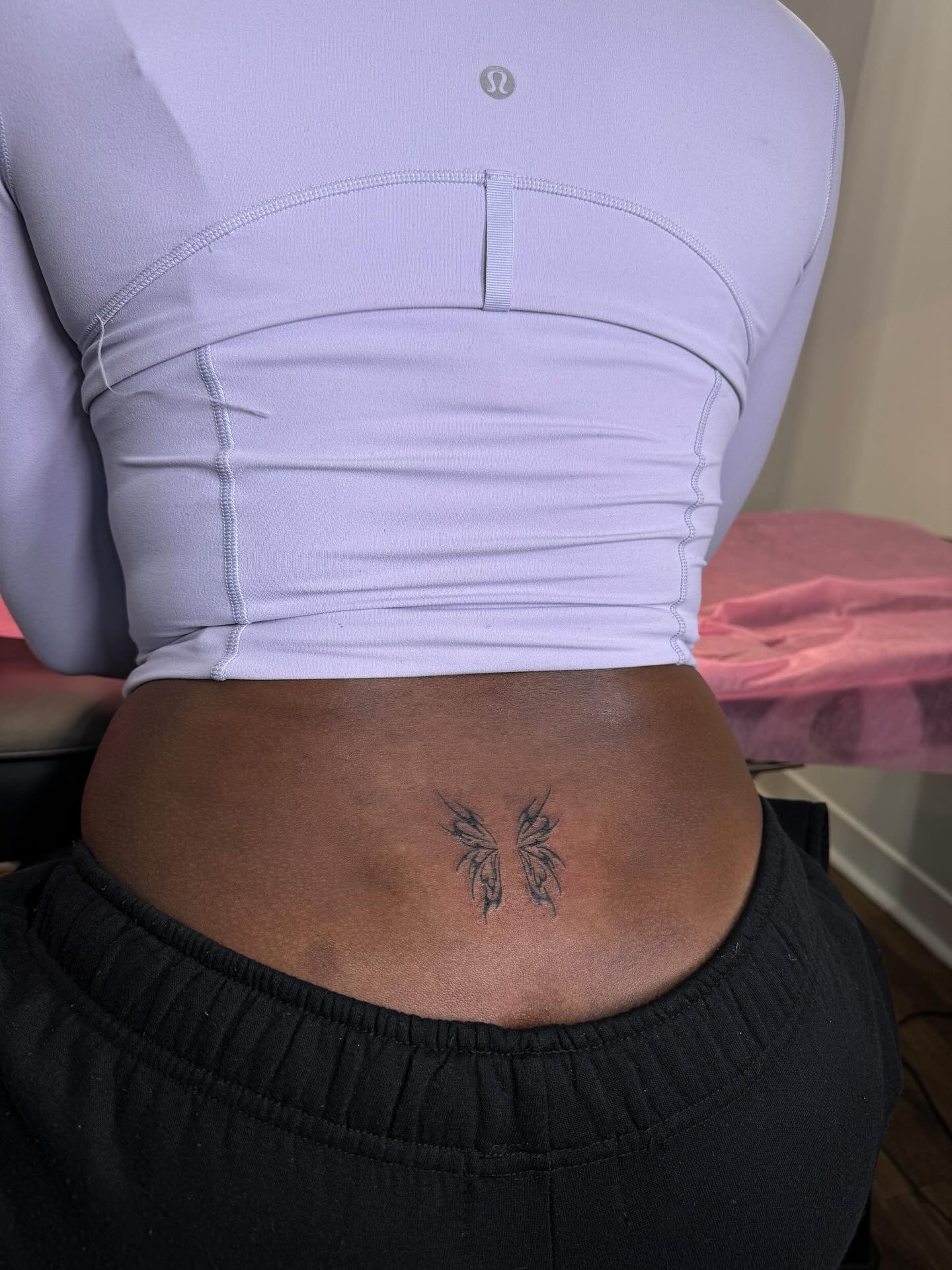 Dainty Butterfly Lower Back Art