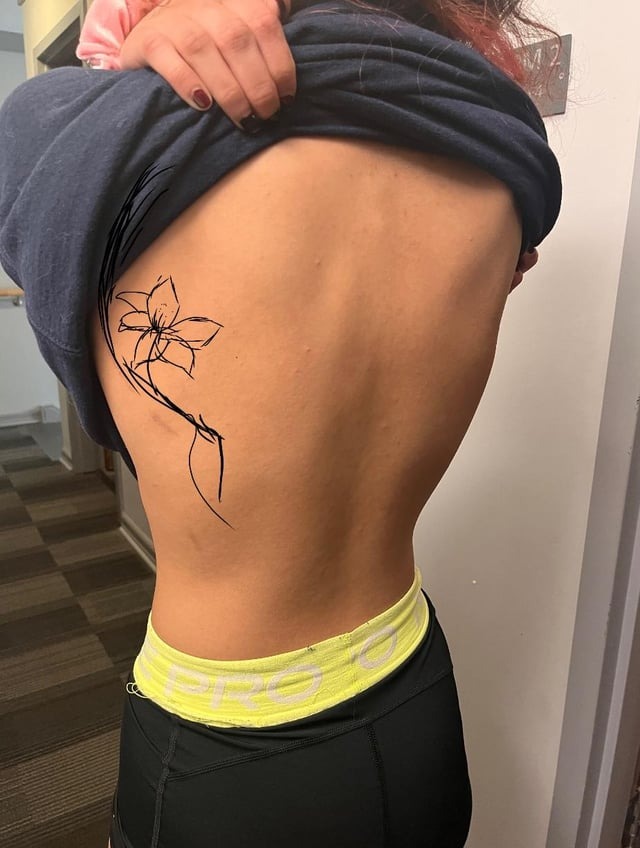 Delicate Floral Lower Back Ink