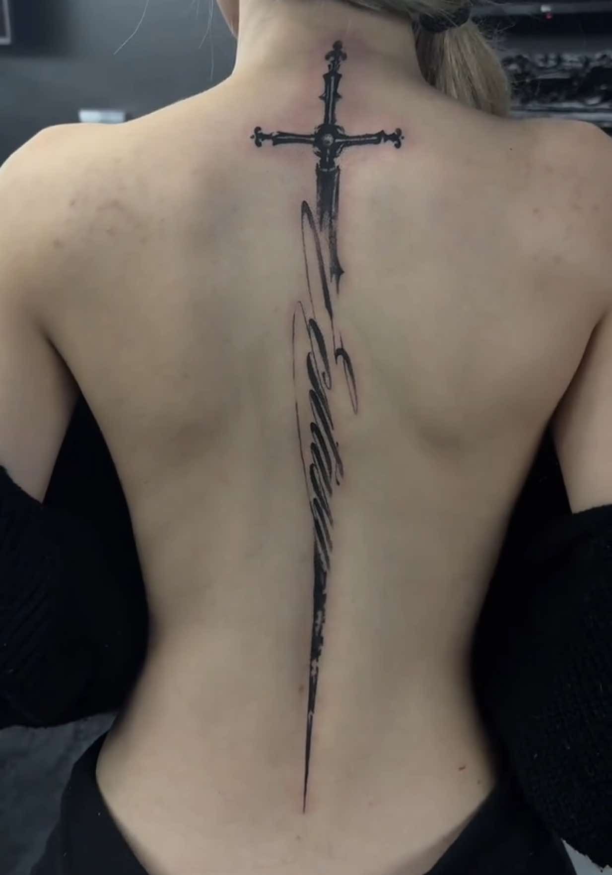 Intricate Sword Spine Tattoo