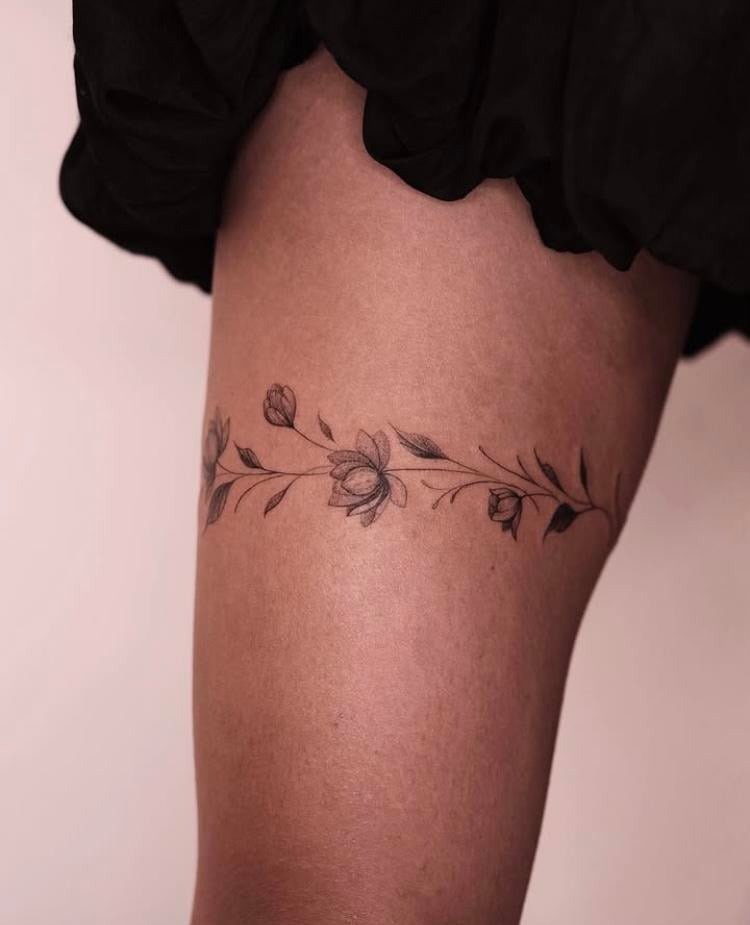 Elegant Floral Thigh Band Tattoo