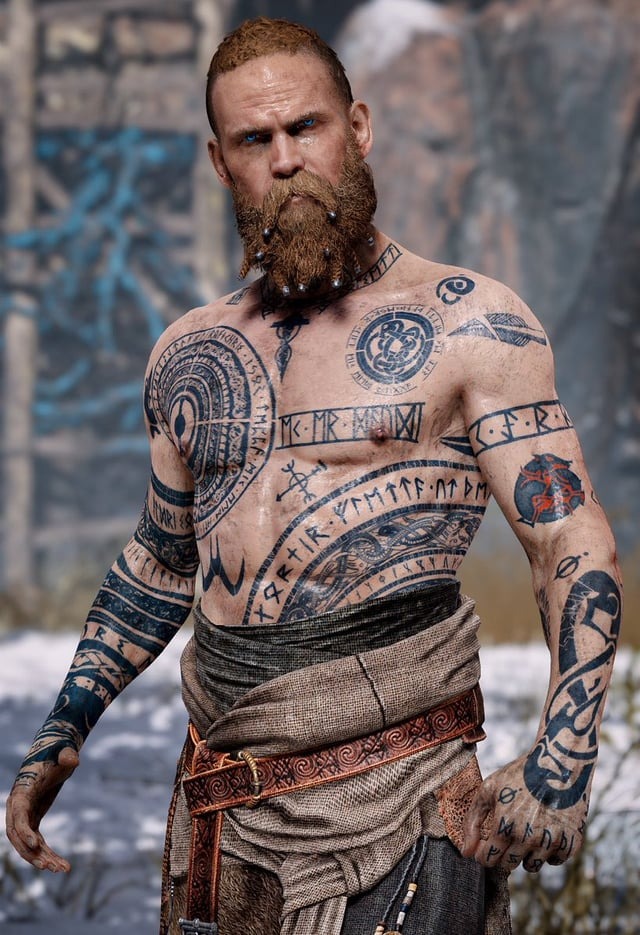 Intricate Viking-inspired sleeve and chest tattoos