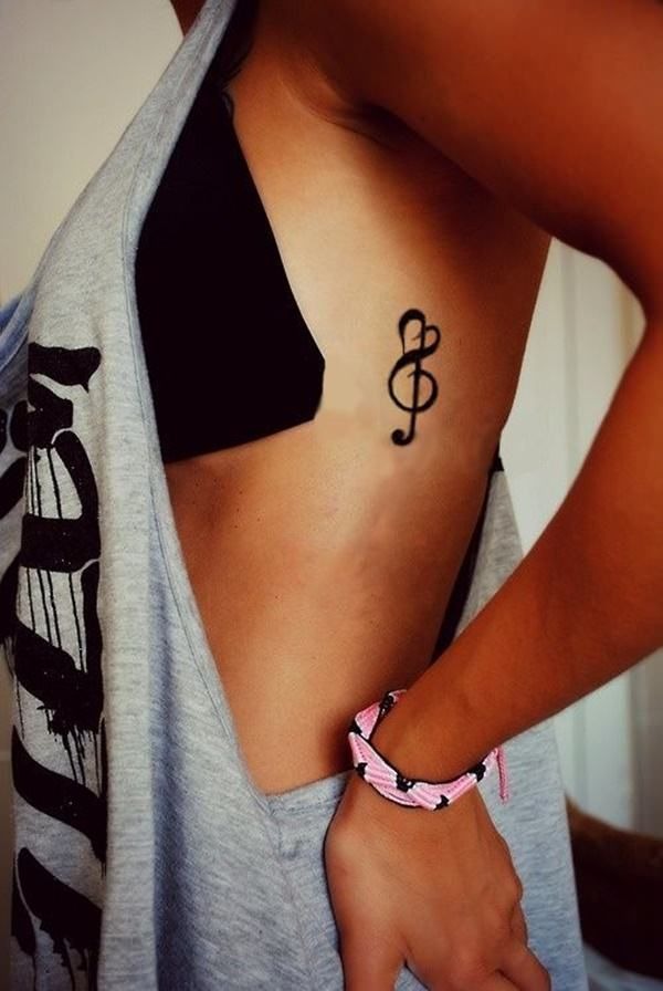 Minimalist Treble Clef Side Rib Tattoo