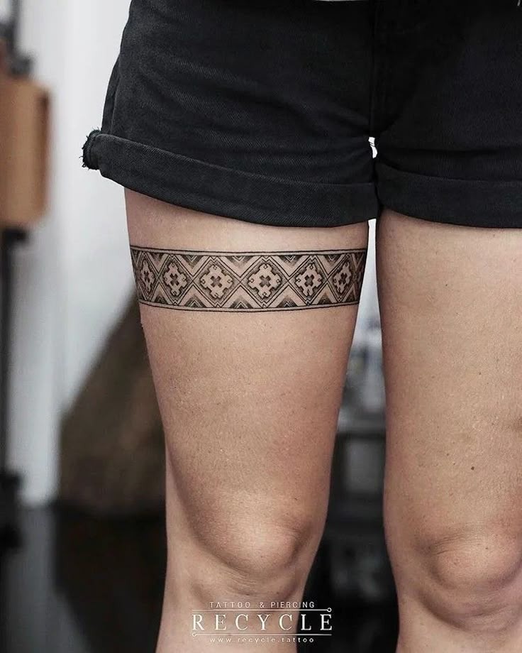 Intricate geometric band tattoo design