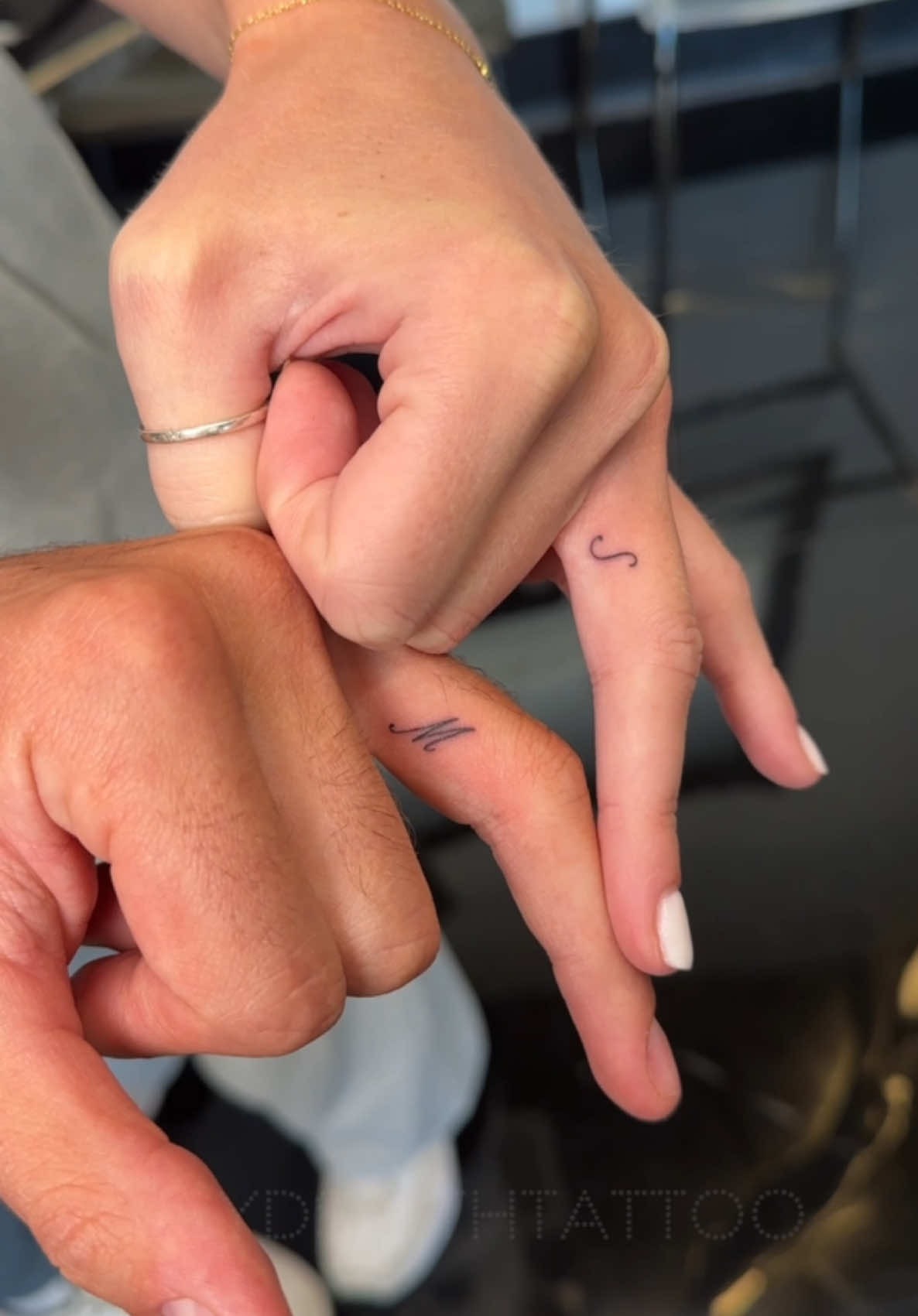 Subtle and dainty matching finger tattoos