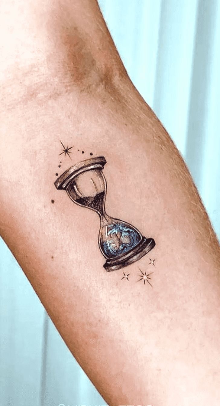 Charming hourglass tattoo with celestial details