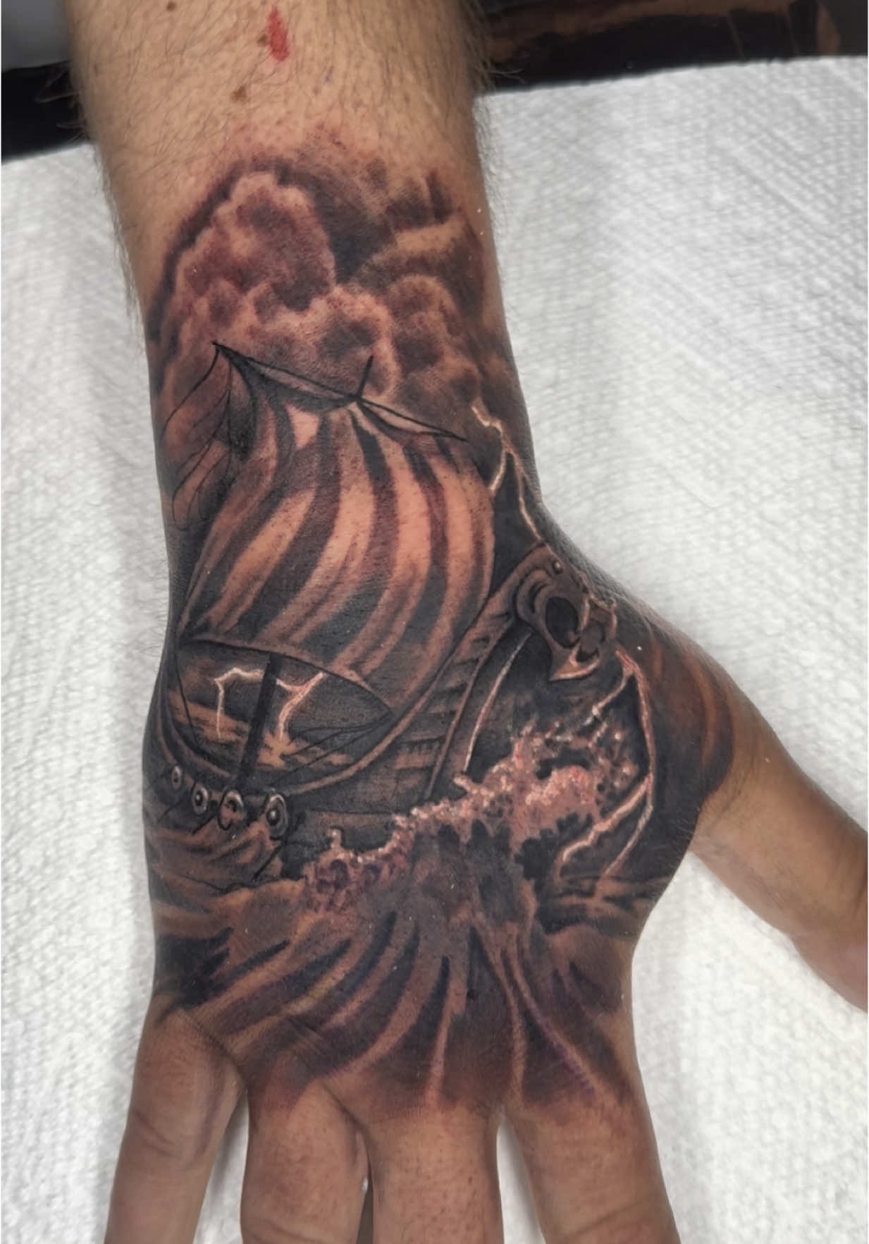 Intricate Viking Longship Hand Tattoo