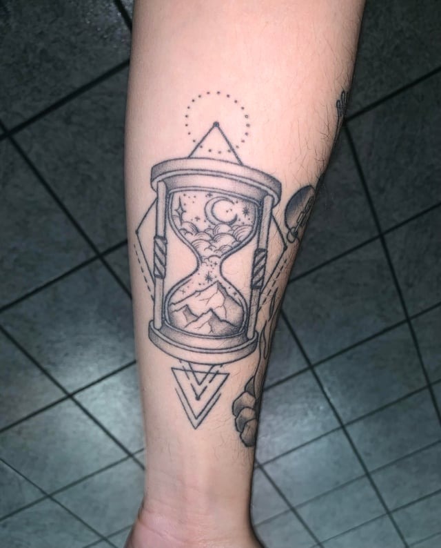 Minimalist geometric hourglass forearm ink