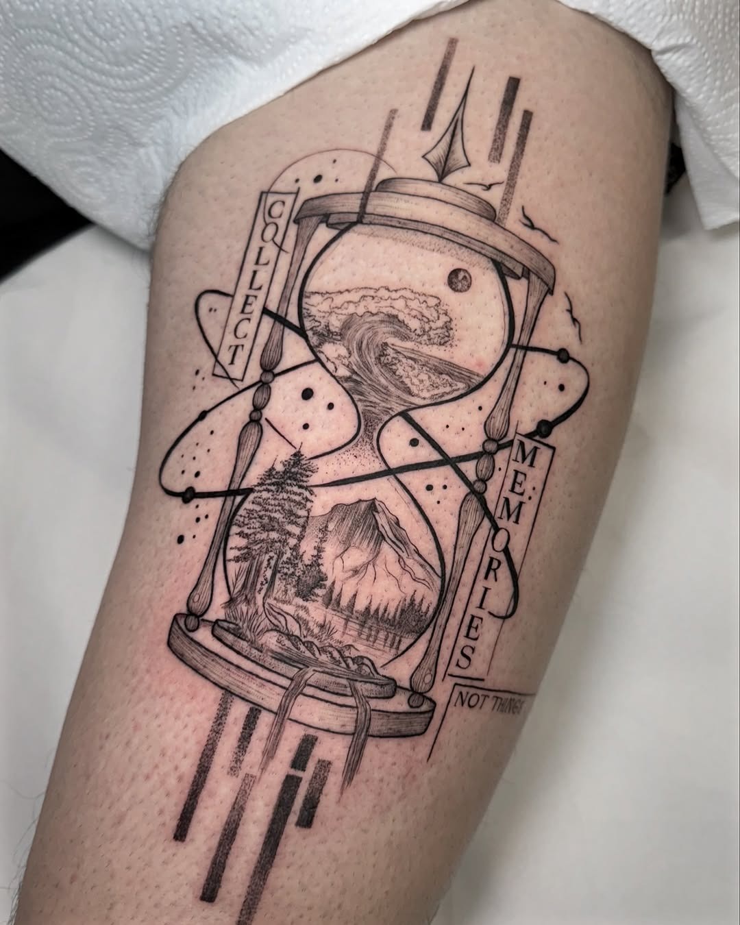 Abstract memory hourglass tattoo concept