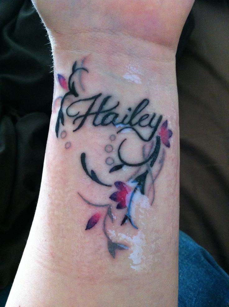 Elegant script tattoo design for wrist