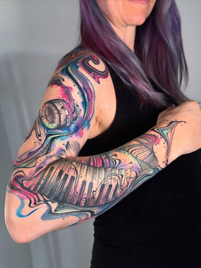 30 Music Lover Tattoo Concepts to Wear Your Favorite Melodies Daily