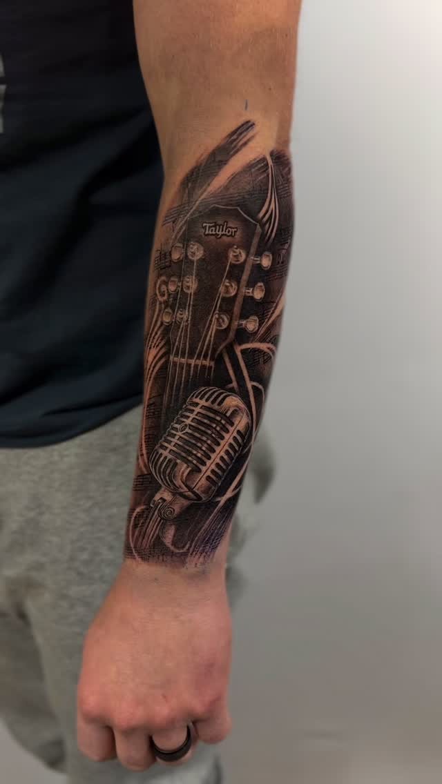 Intricate Guitar and Microphone Forearm Sleeve