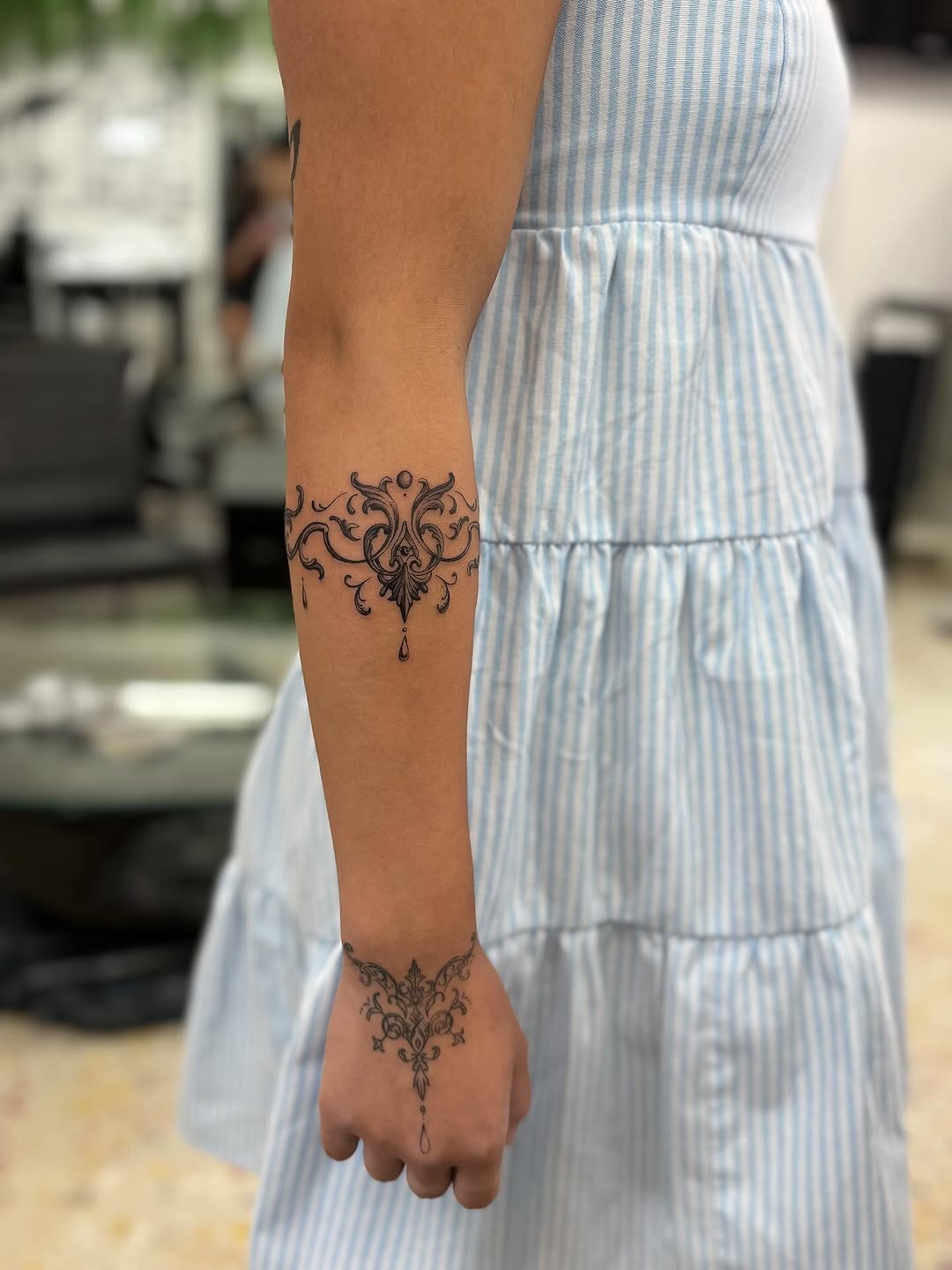 Elegant Ornamental Arm Tattoo Design
