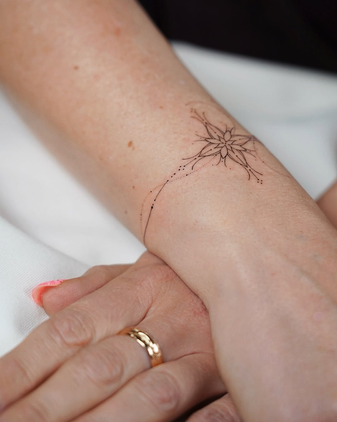 Elegant minimalist bracelet wrist tattoo