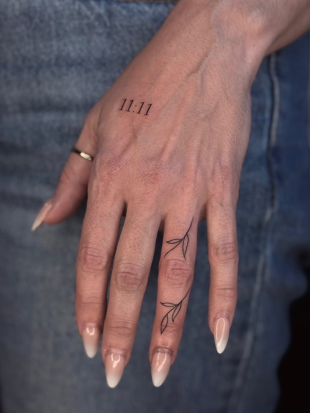 Modern Fine-Line Hand Tattoo