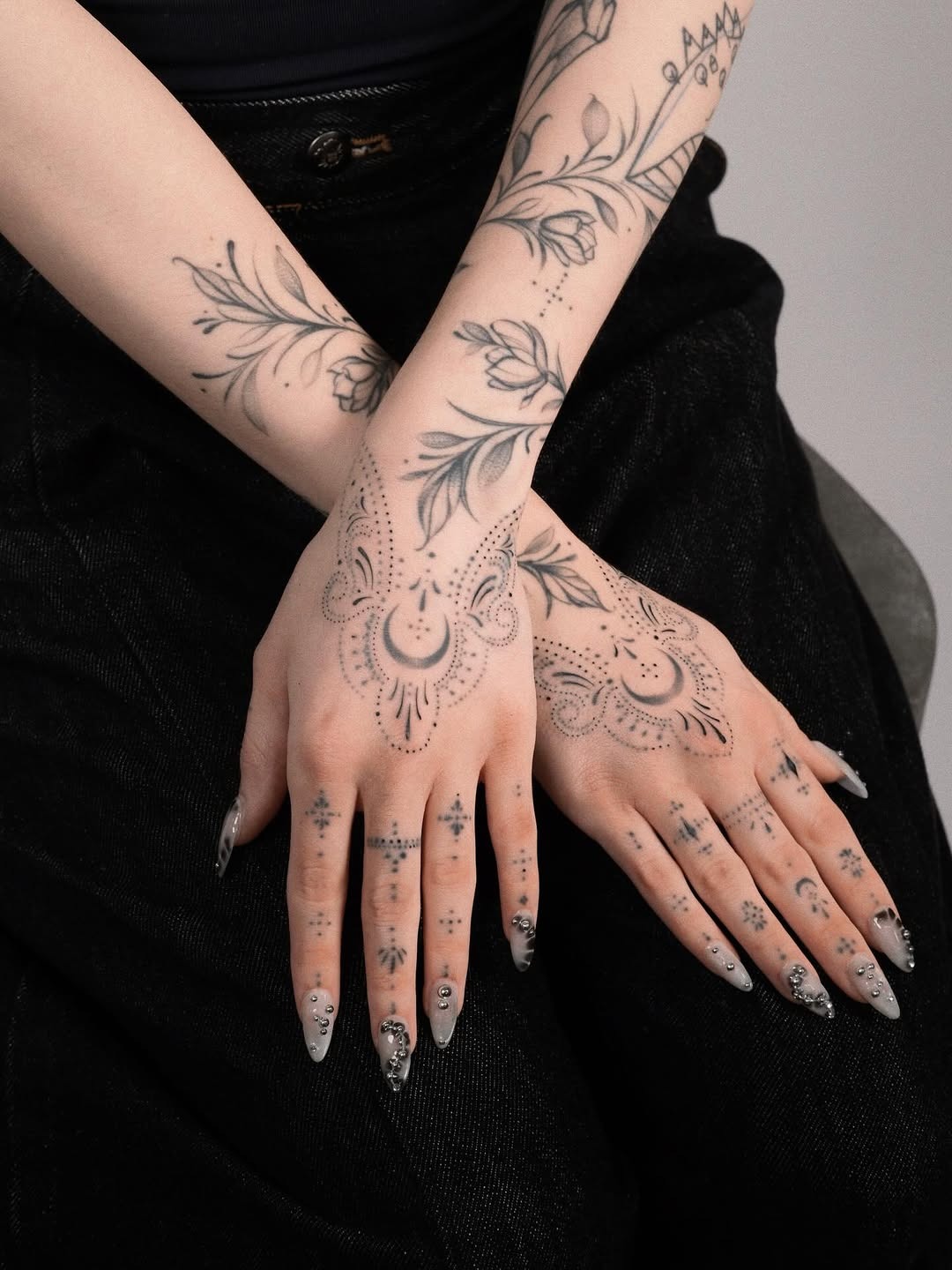 Delicate and intricate hand-adorned tattoo art