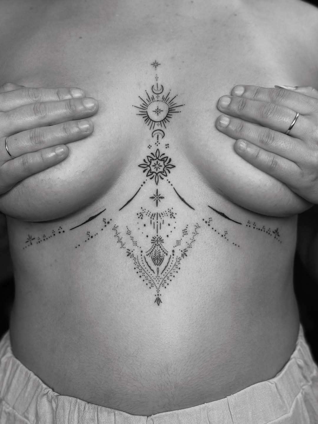 Intricate Ornamental Sternum and Under-Breast Tattoo