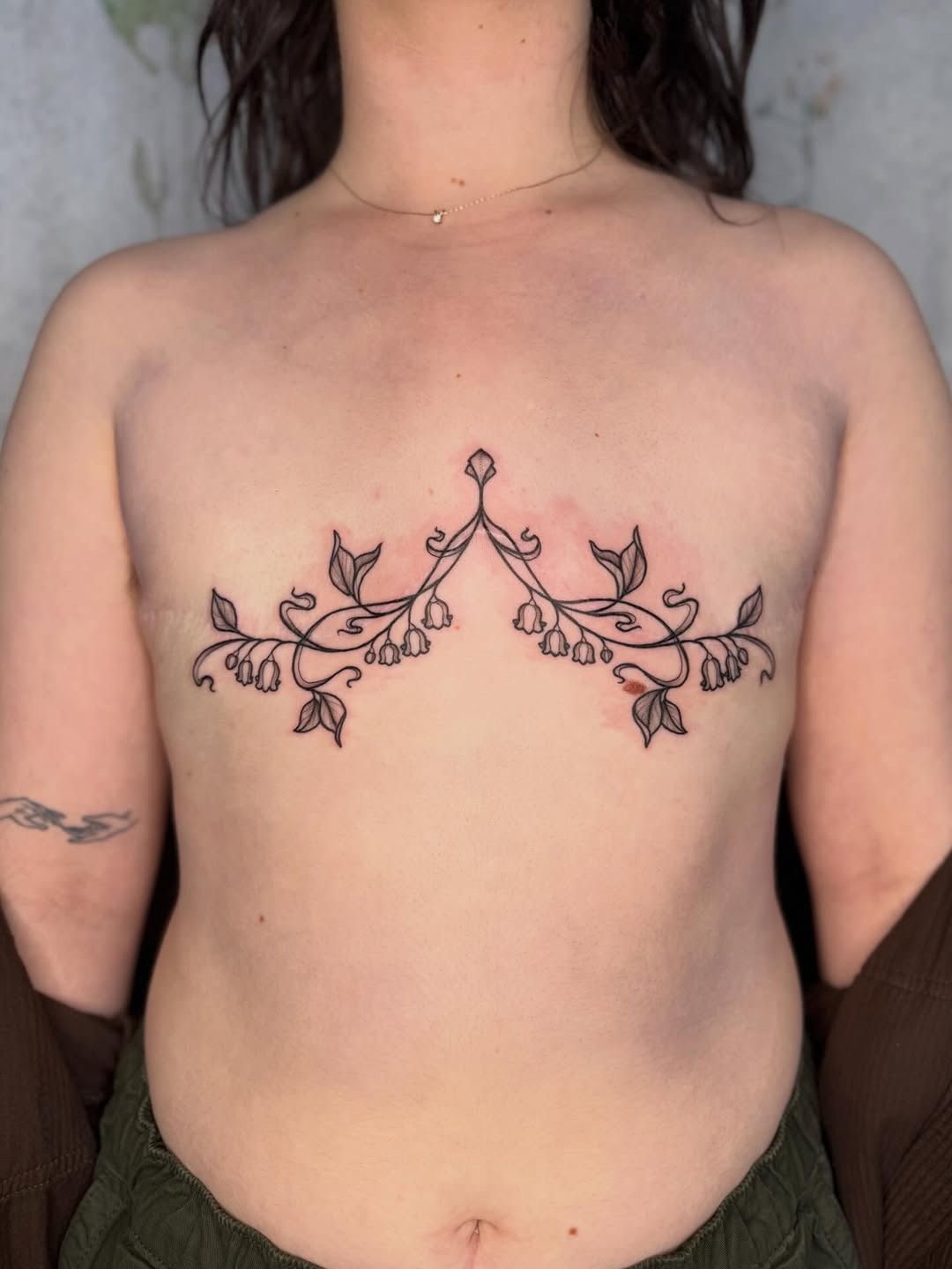 Elegant Minimalist Vine Tattoo Under the Breast