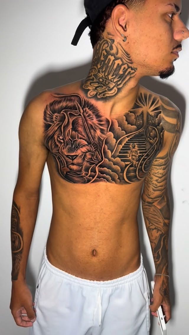 Detailed lion and scenery chest piece