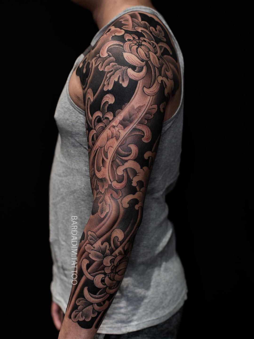 Classic Japanese Wave and Flower Tattoo