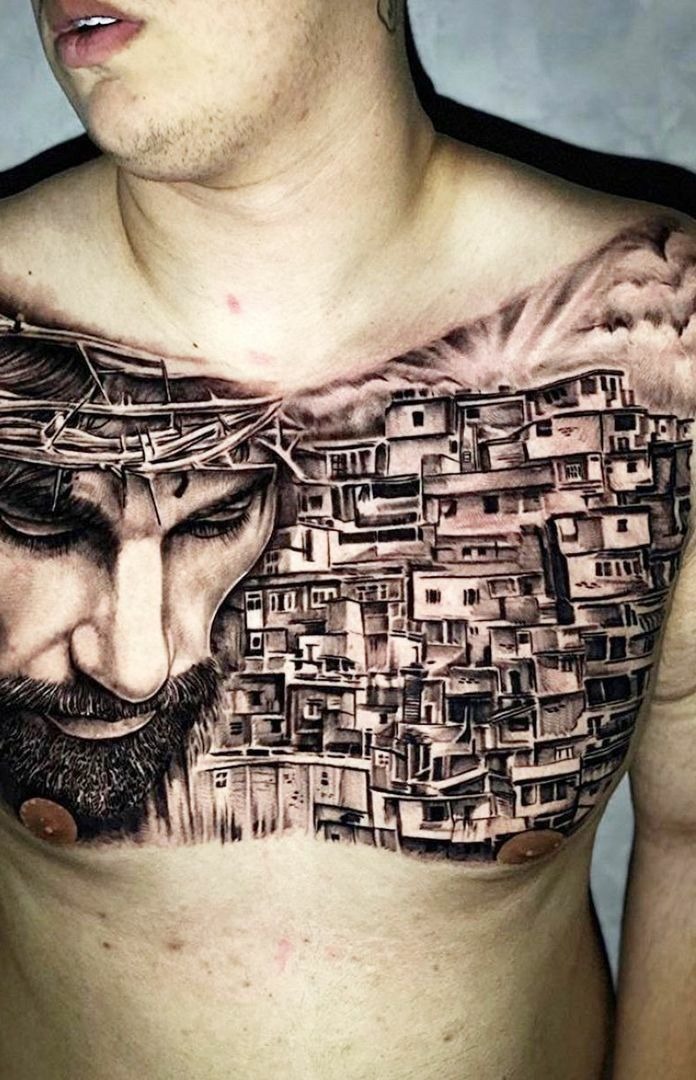 Tattoo religiosa e social no peitoral
