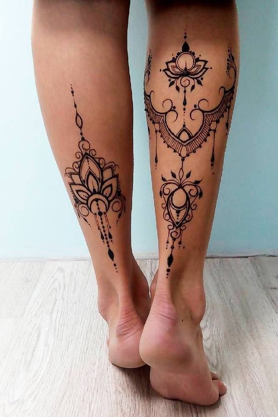 Symmetrical Ornamental Shin Tattoos