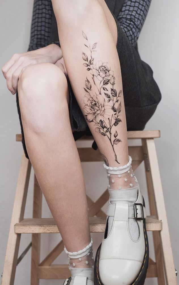 Sophisticated Floral Botanical Tattoo