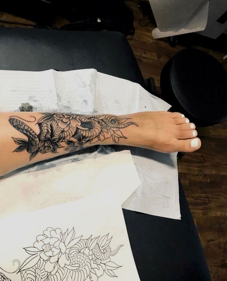 Delicate Floral Shin Tattoo Concept