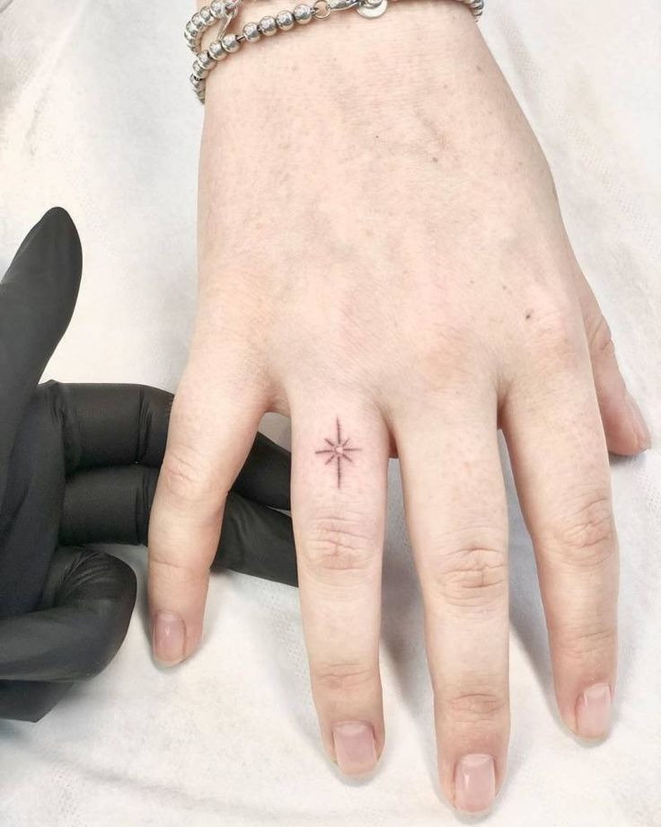 Sophisticated Finger North Star Tattoo