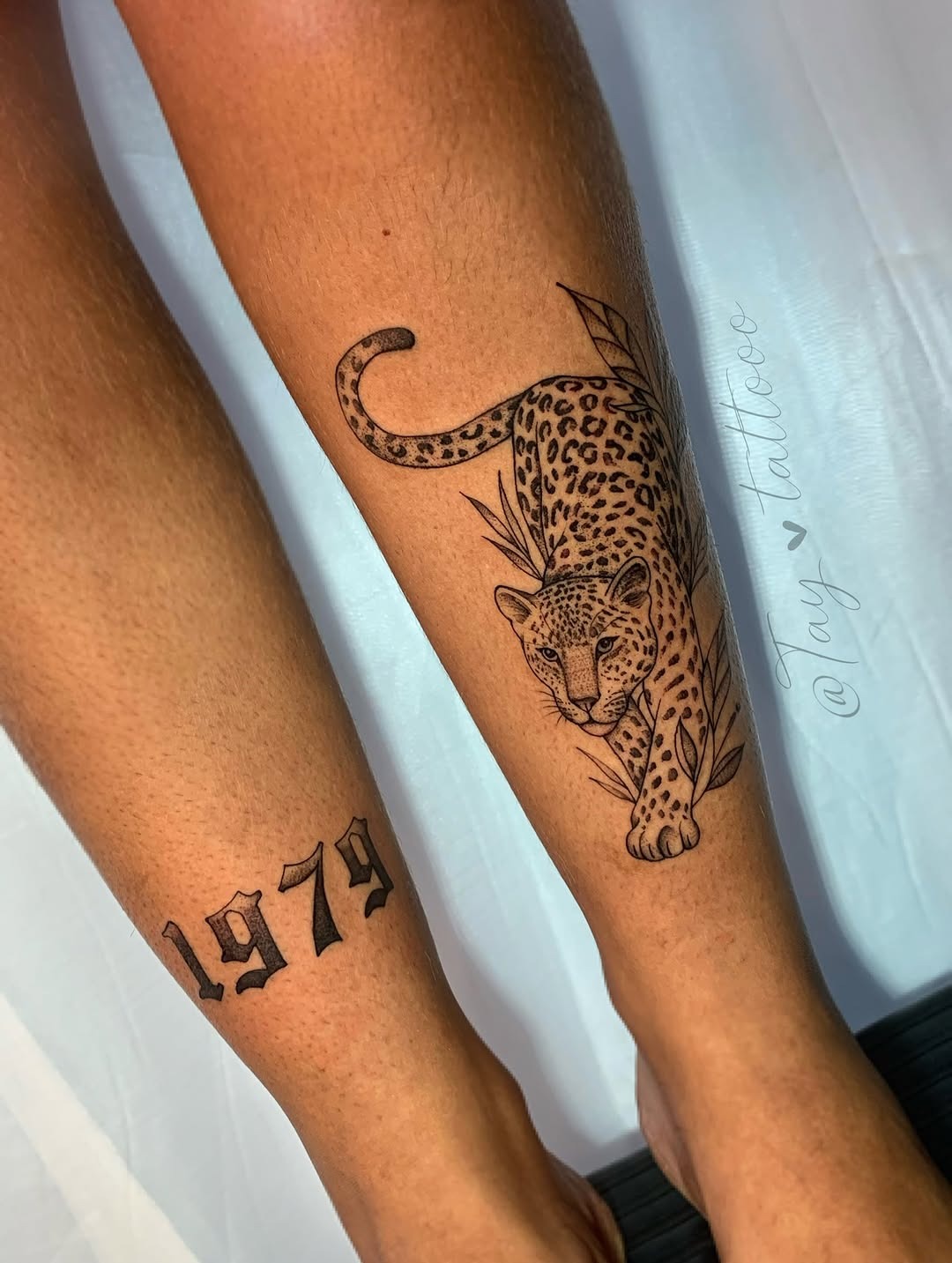 Stylized Leopard and Date Script Tattoo