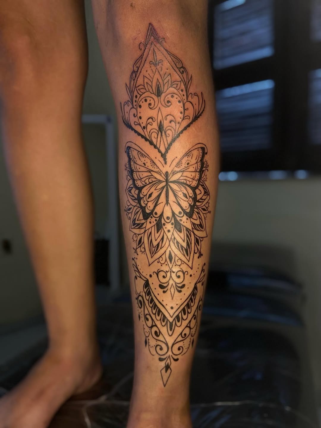 Intricate Mandala and Butterfly Tattoo