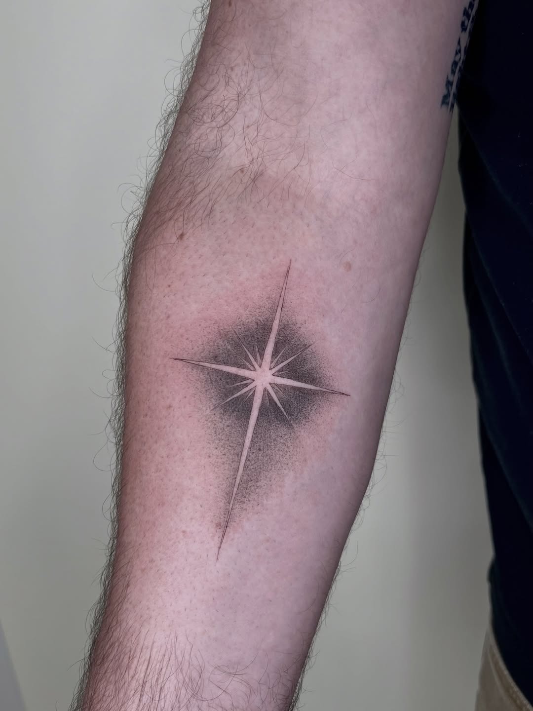 Glowing Celestial Star Tattoo