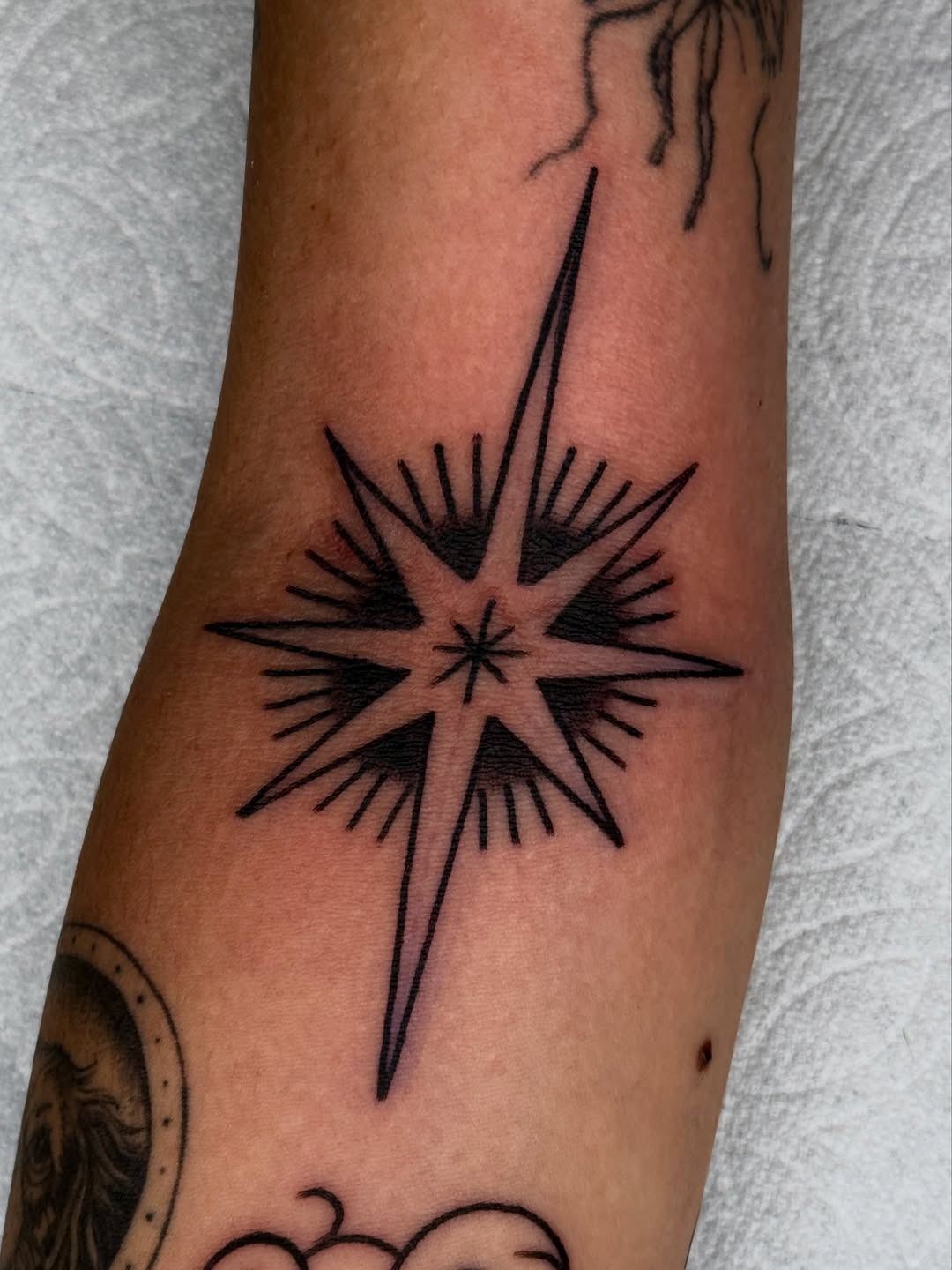 Detailed Star Tattoo Art