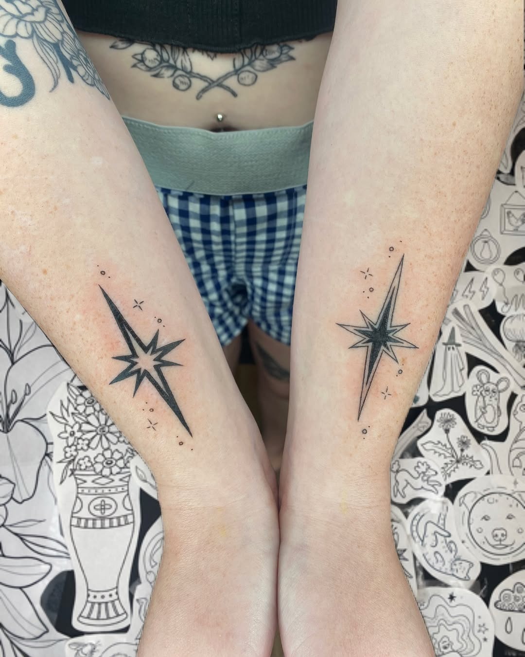 Matching stellar wrist tattoos