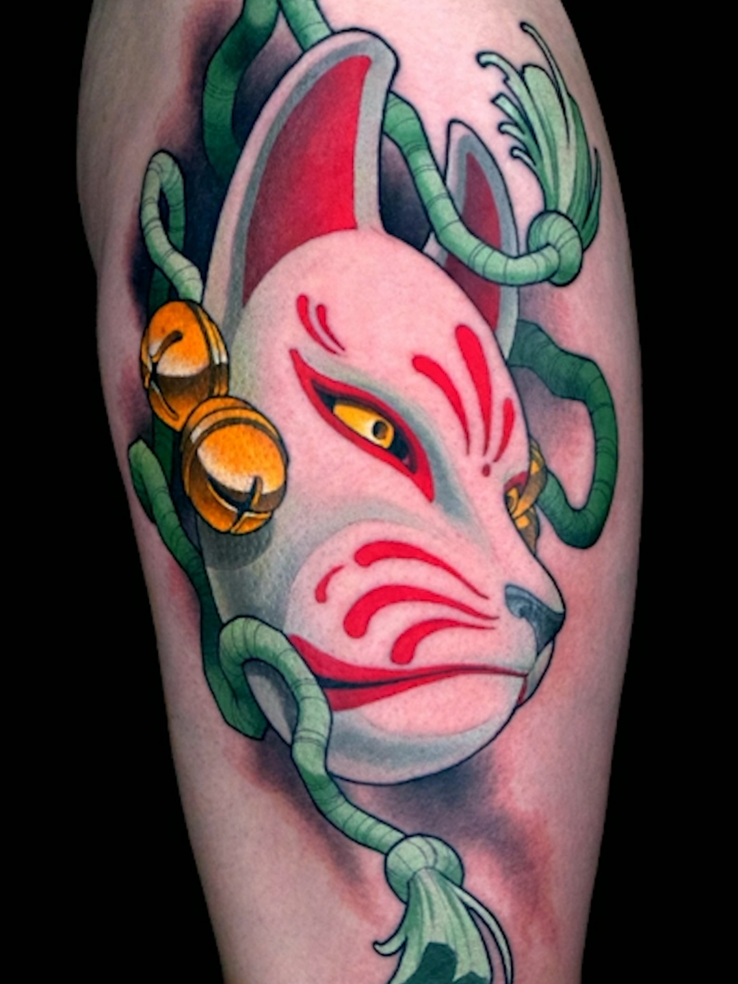 Vibrant Japanese kitsune mask sleeve design