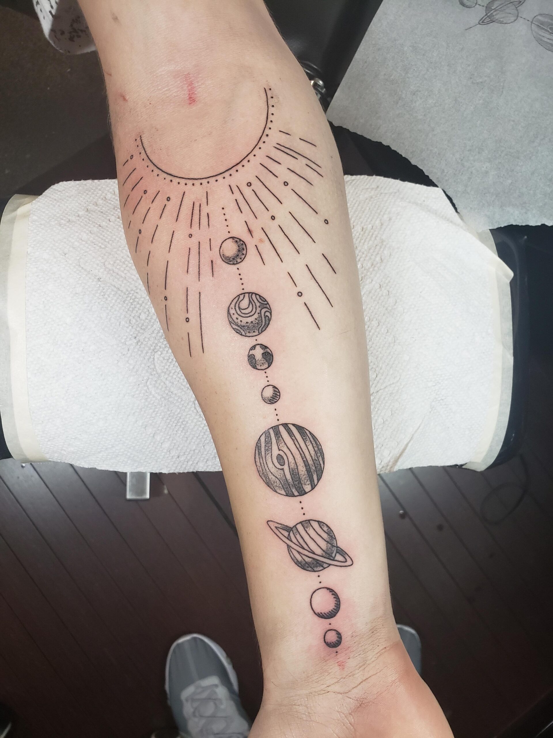 Minimalist Linework Sun and Planet Tattoo
