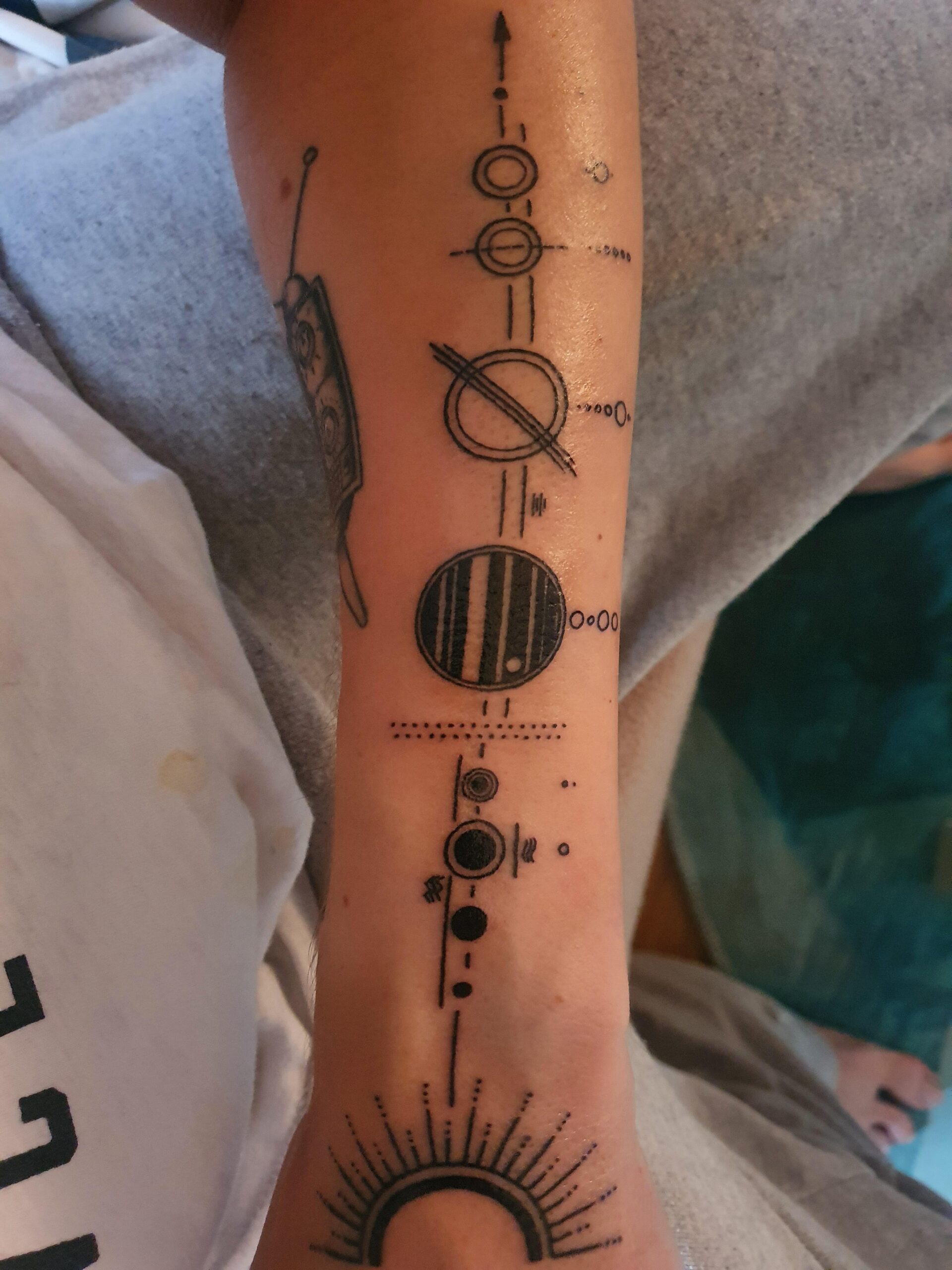 Minimalist Solar System Forearm Ink