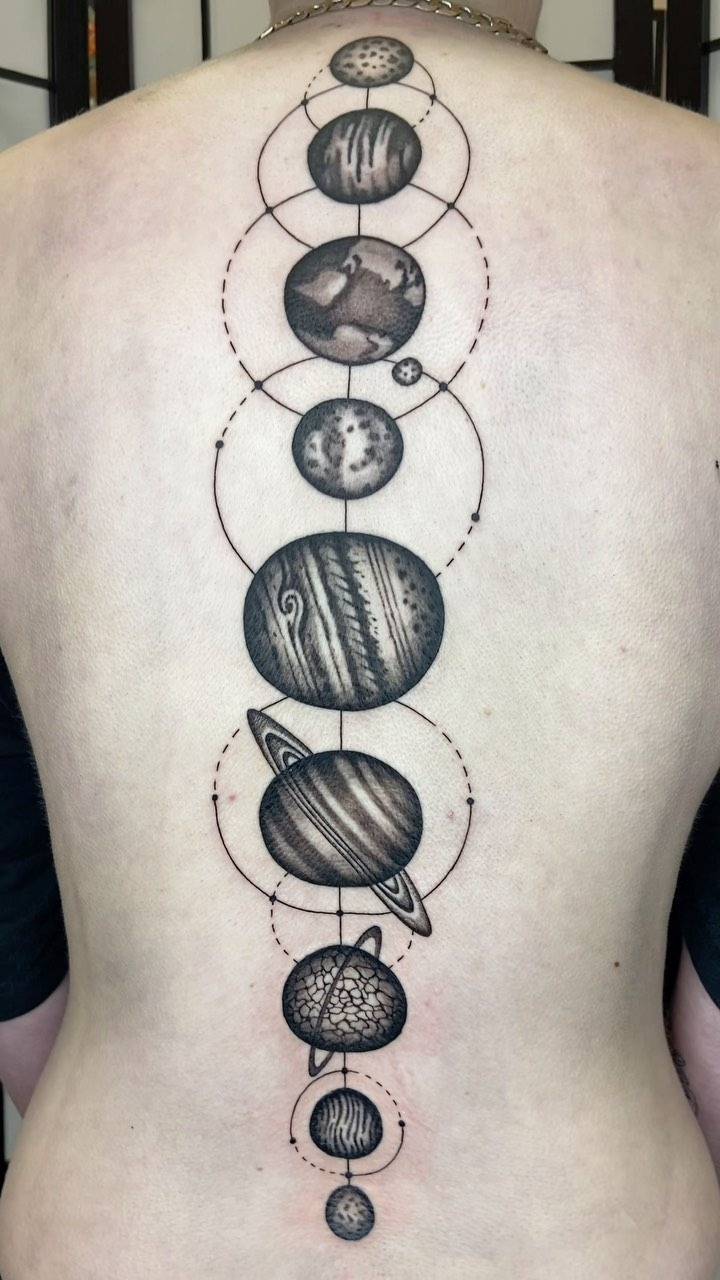 Stunning Spine Placement Solar System Tattoo