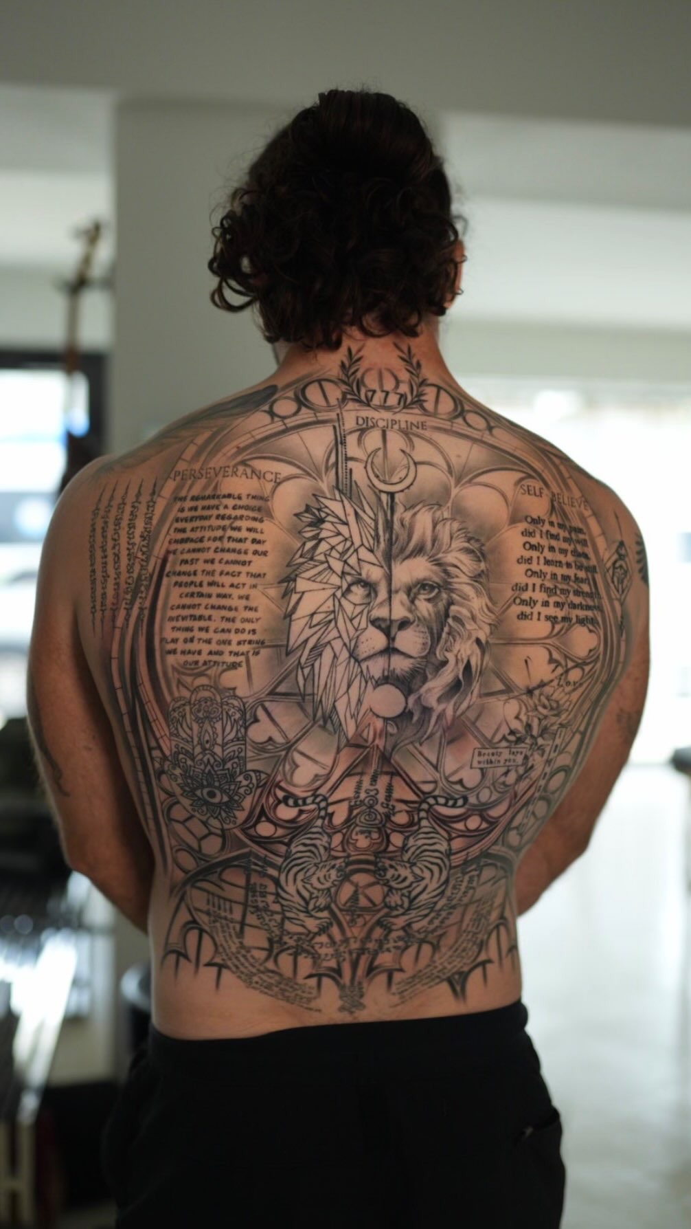 Intricate Lion Back Tattoo Piece