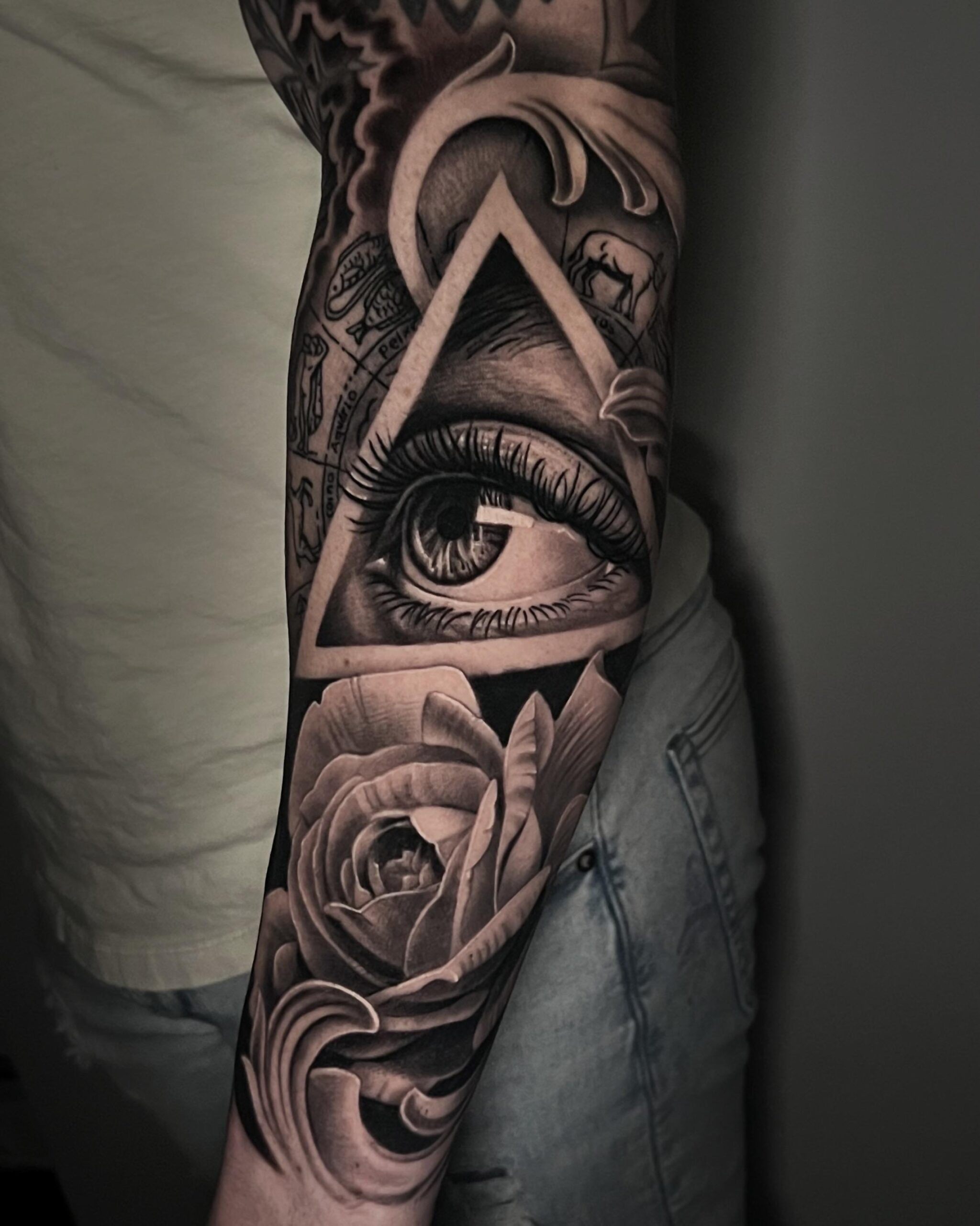 Intricate All-Seeing Eye Sleeve Tattoo