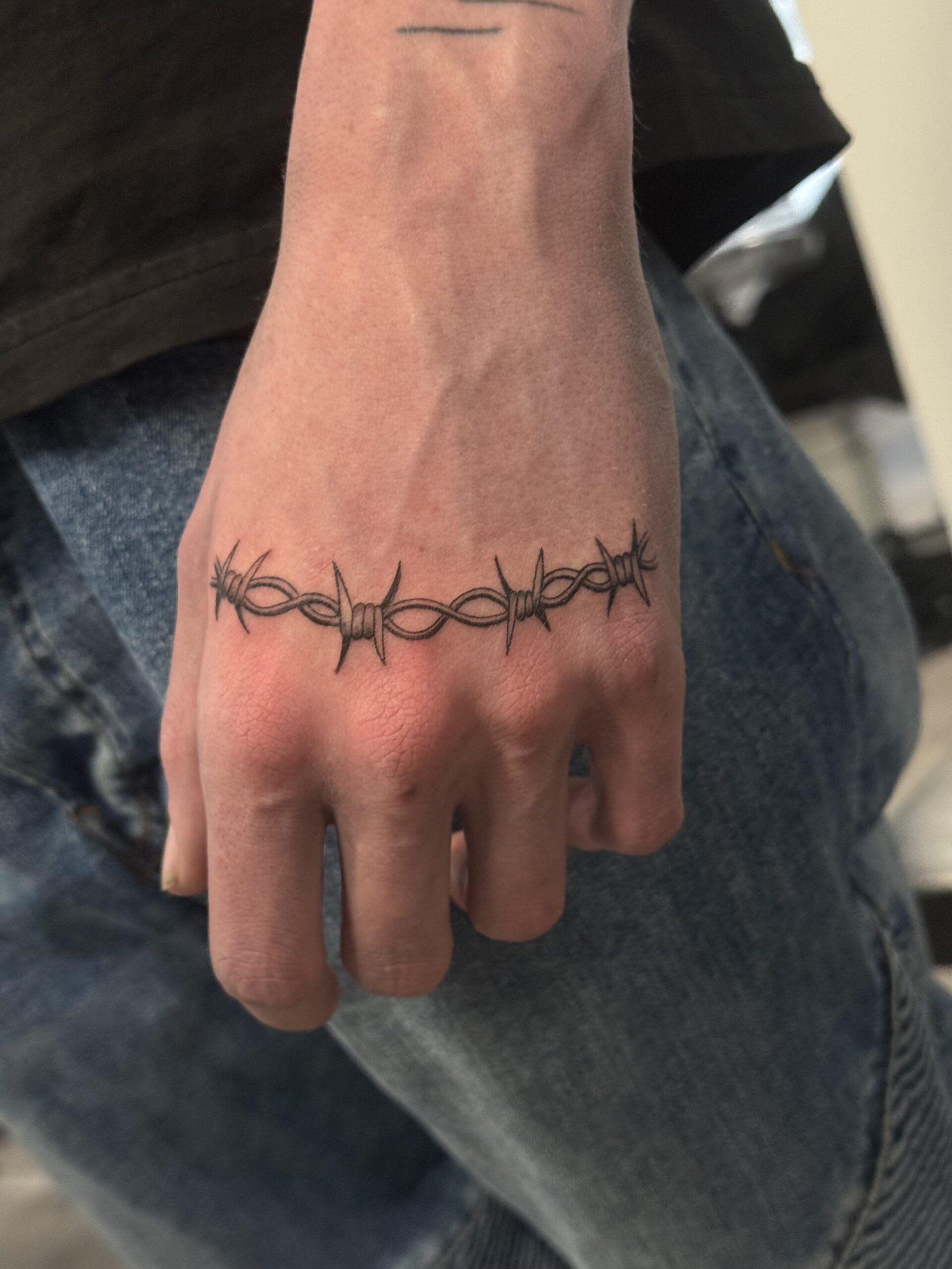 Hand Placement Barbed Wire Design