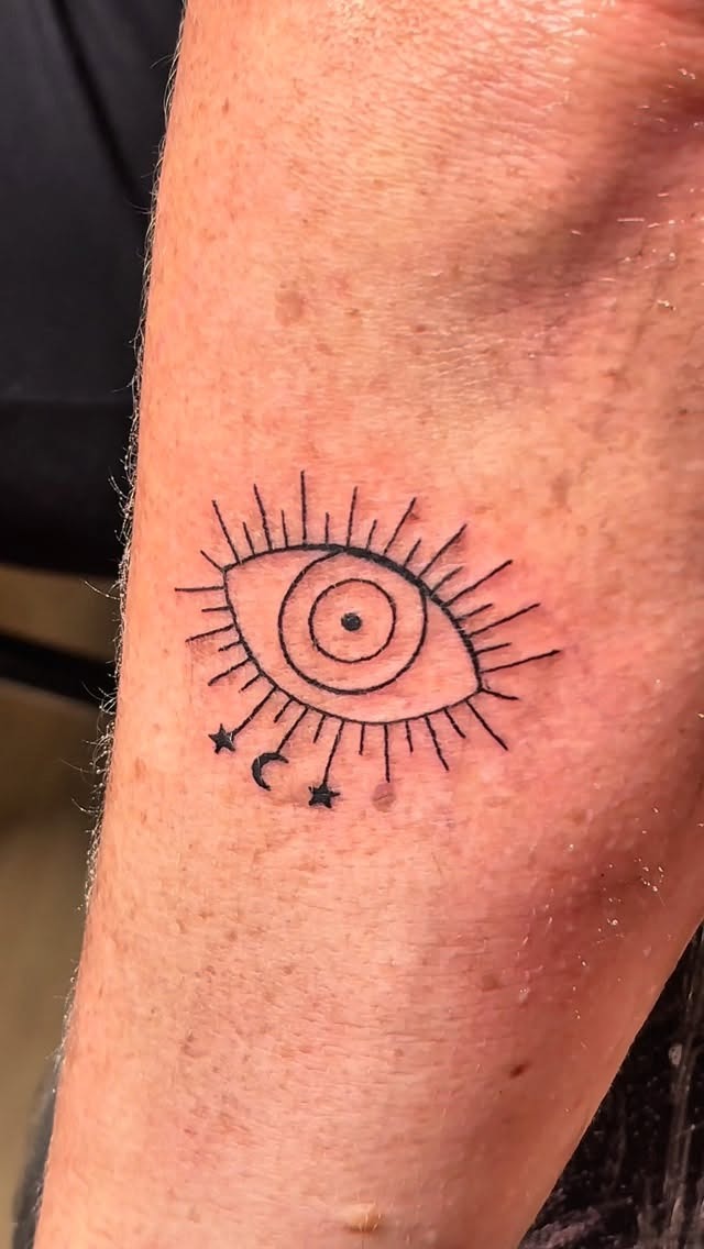 Delicate Single-Line Third Eye Tattoo