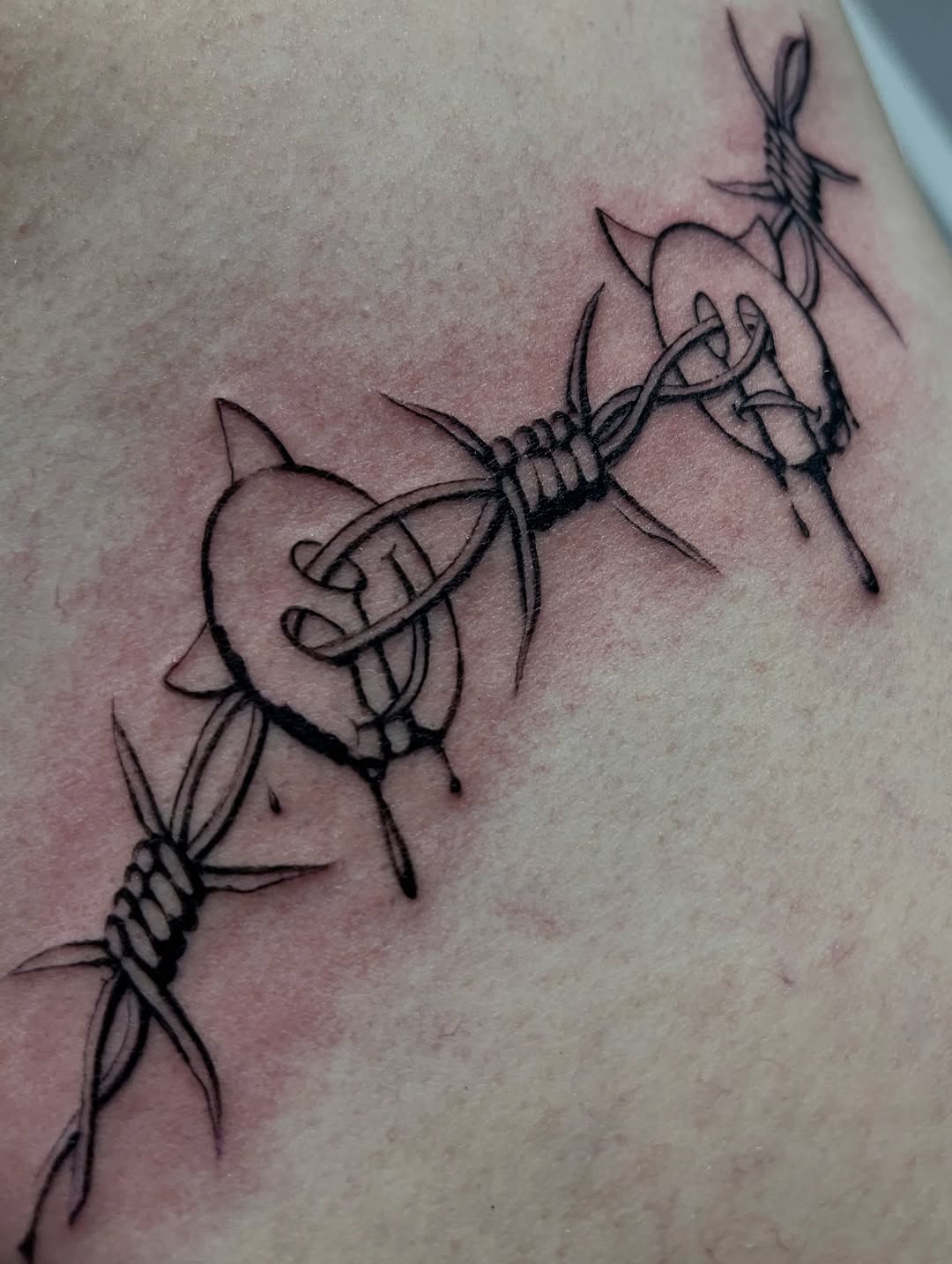 Detailed Iconographic Barbed Wire Tattoo