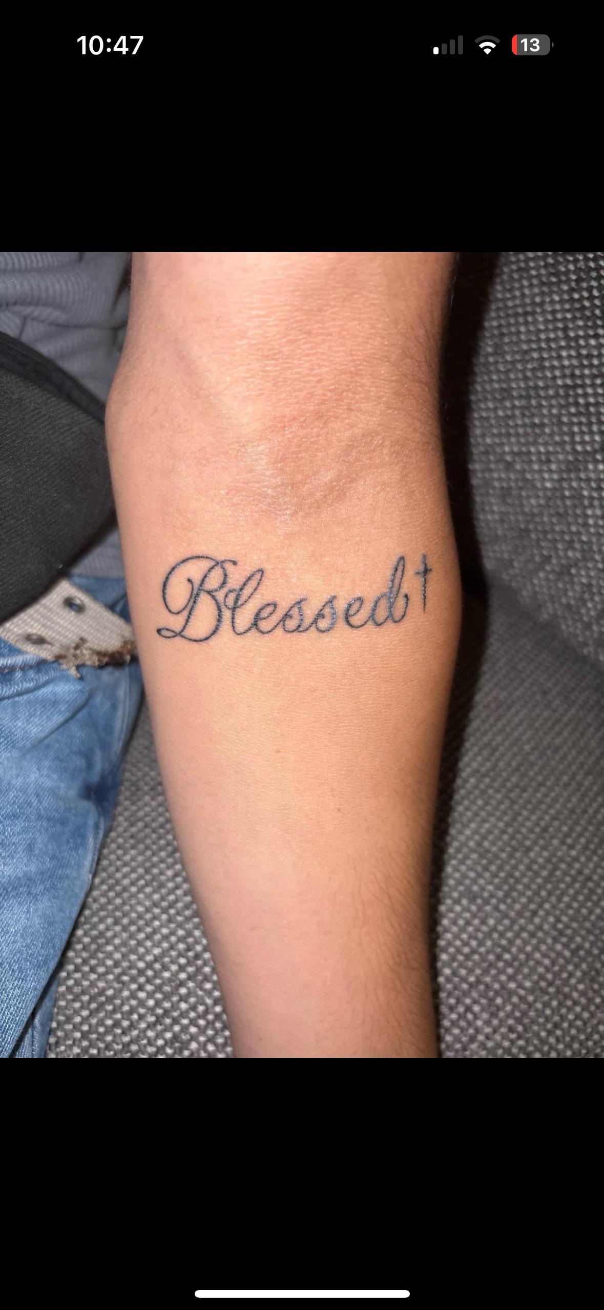 Simple 'Blessed' Lettering Tattoo