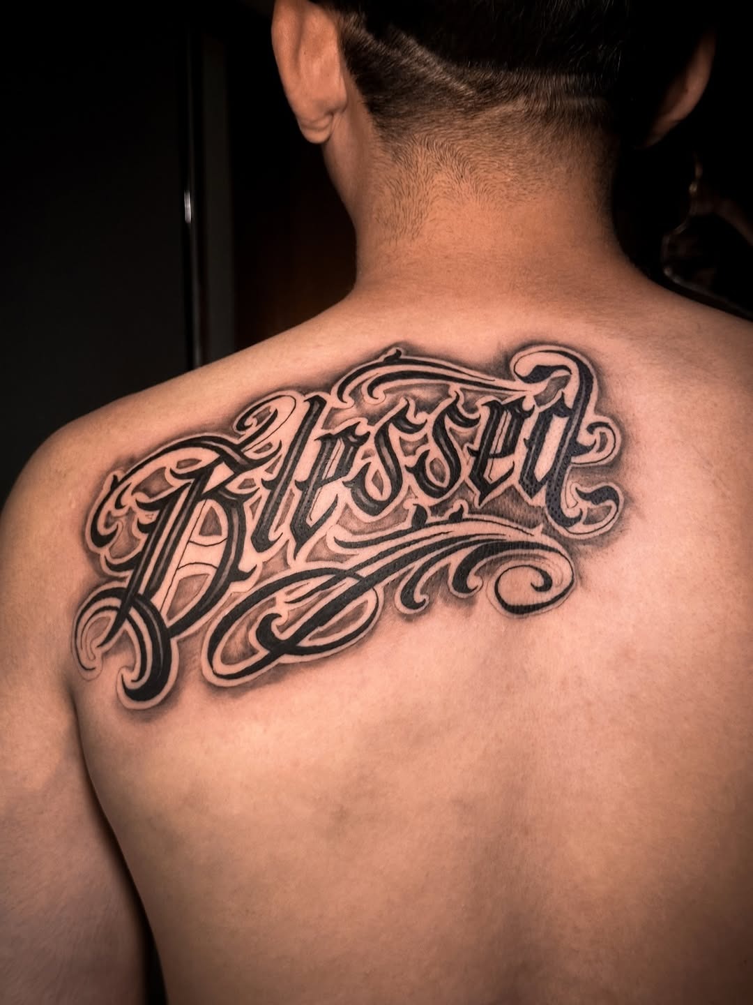 Bold Script 'Blessed' Center Back Tattoo