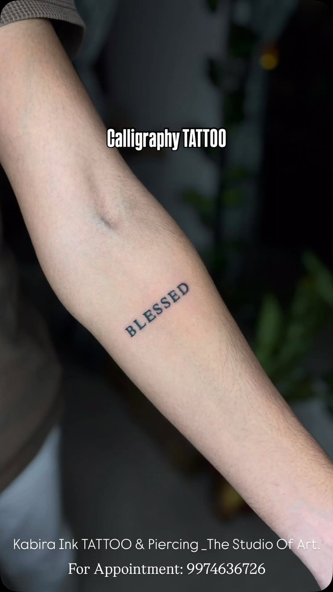 Minimalist 'Blessed' forearm script tattoo