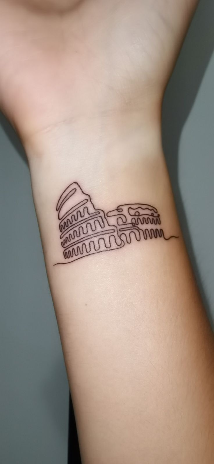 Minimalist Colosseum Line Art Tattoo
