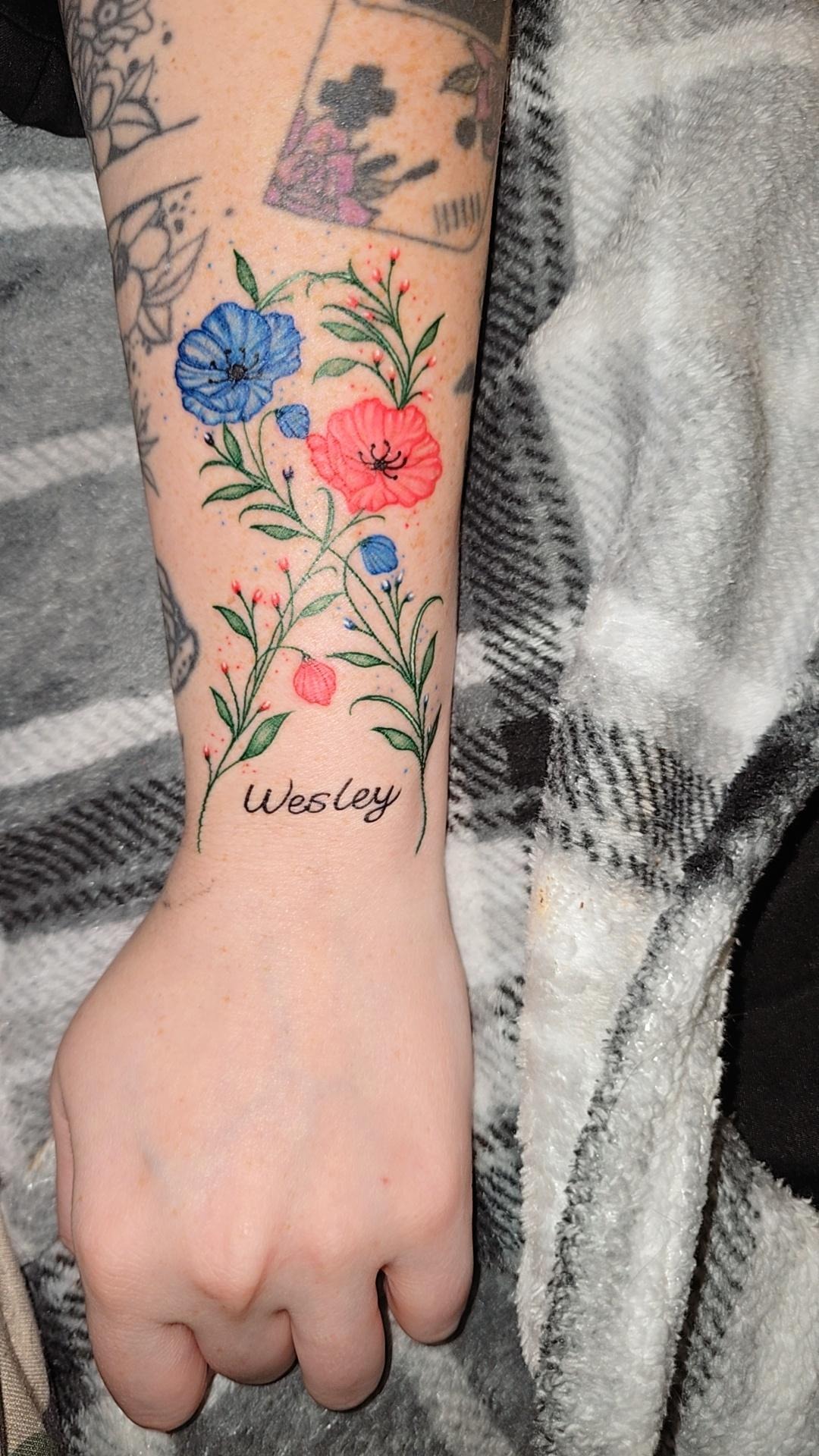 Delicate Floral Memorial Tattoo Design