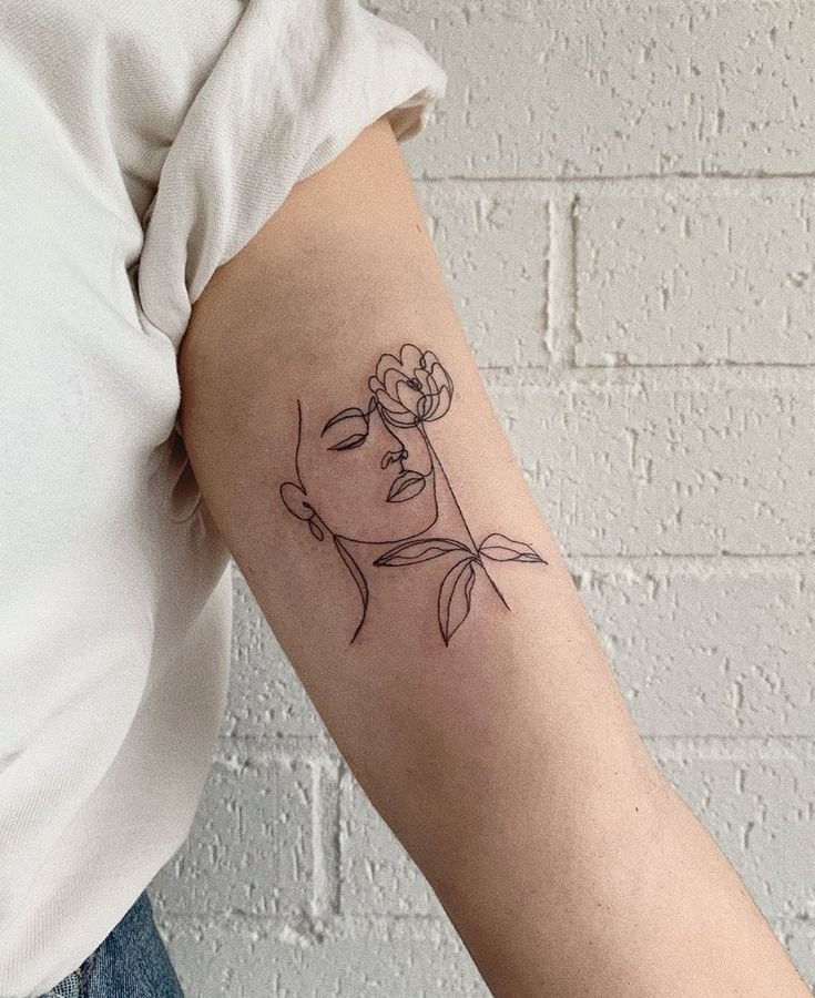 Minimalist Female Line Art Tattoo