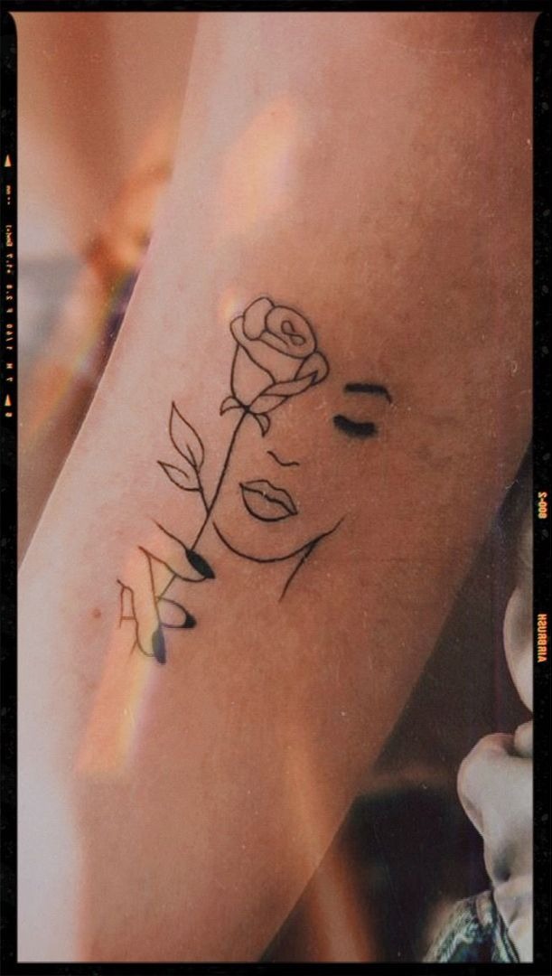 Floral Face Silhouette Tattoo